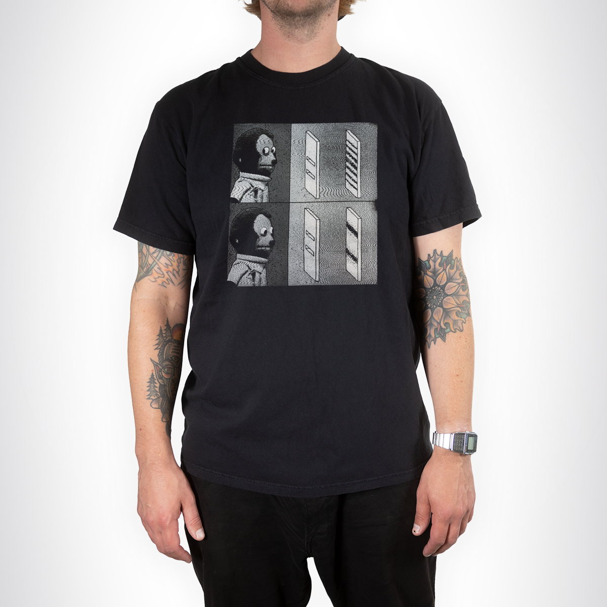 Model wearing the black Double Slit Shirt with a grayscale quantum experiment graphic