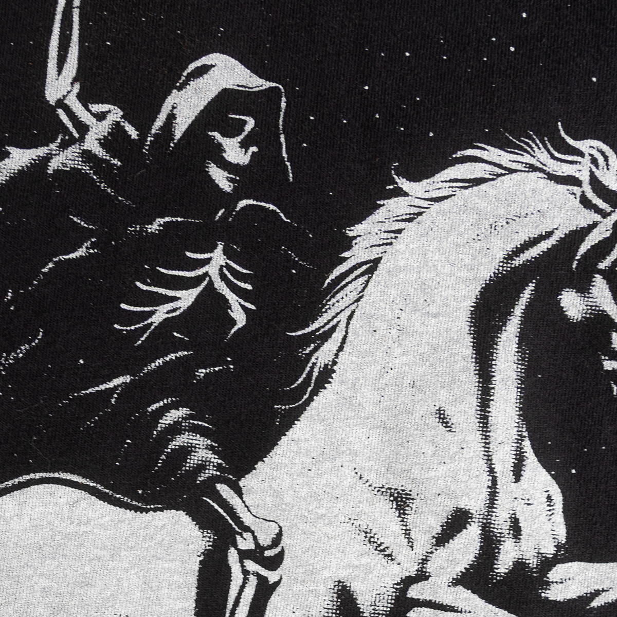 Close-up of the reaper and unicorn print