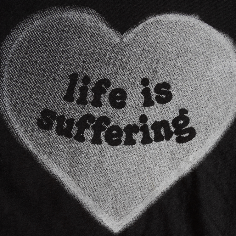 Close-up of Life Is Suffering heart graphic