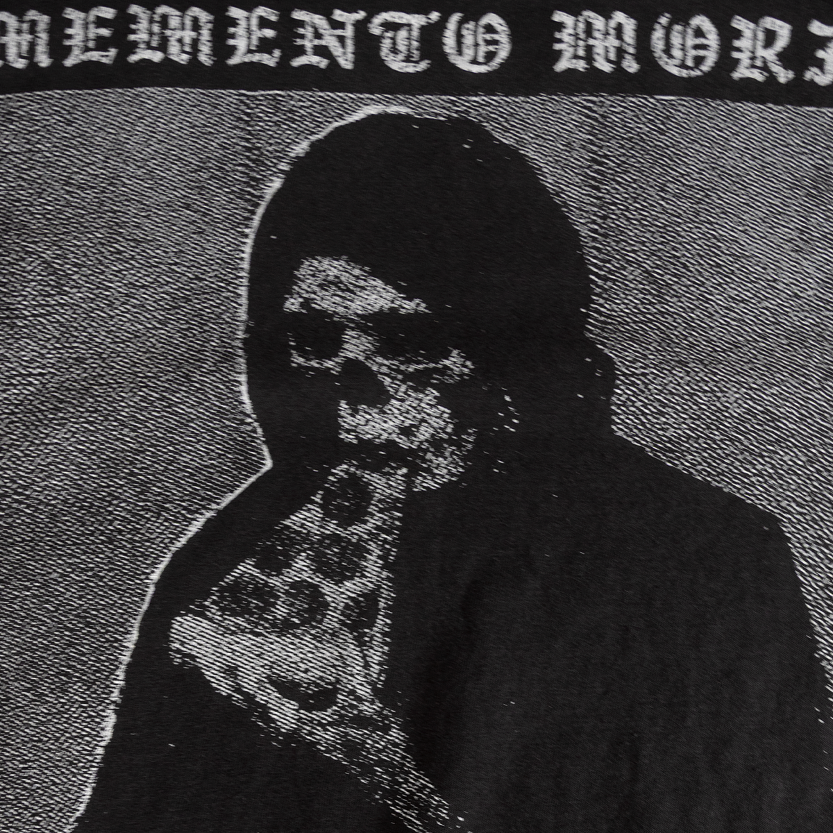 Close-up of Memento Mori back print