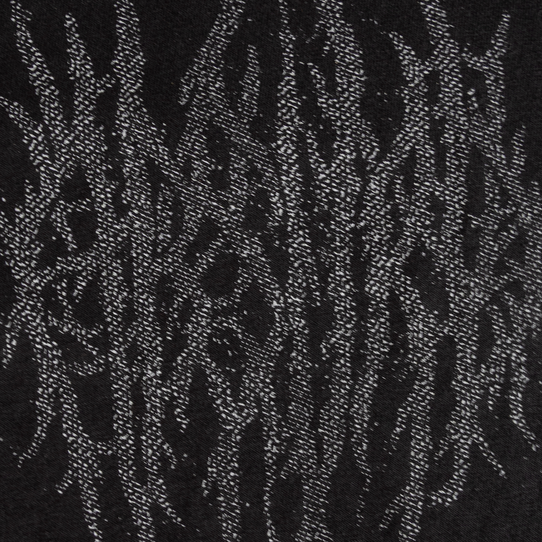 Close-up of the tangled gray front graphic