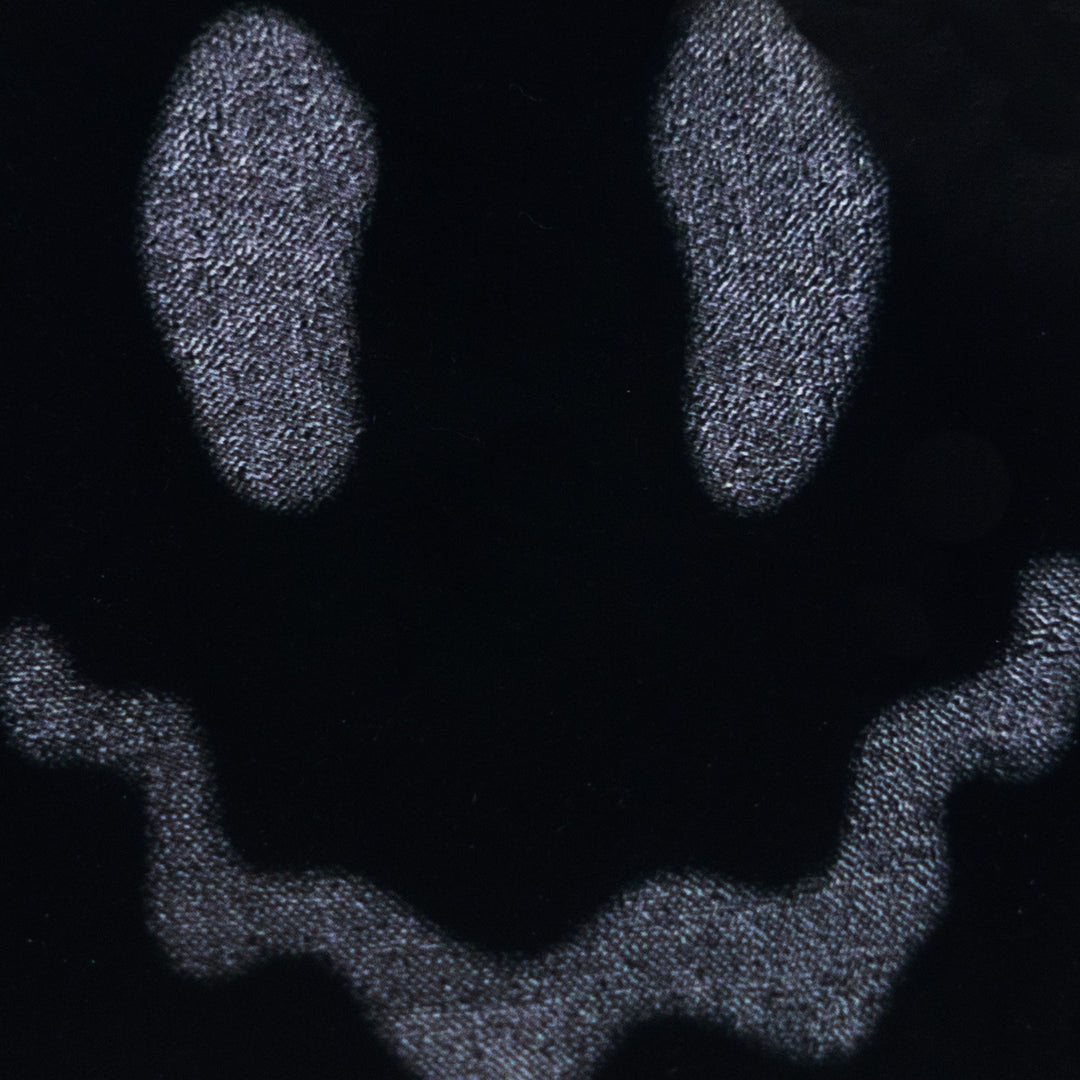 Smiley Sticker — close-up texture detail