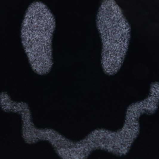 Smiley Sticker — close-up texture detail