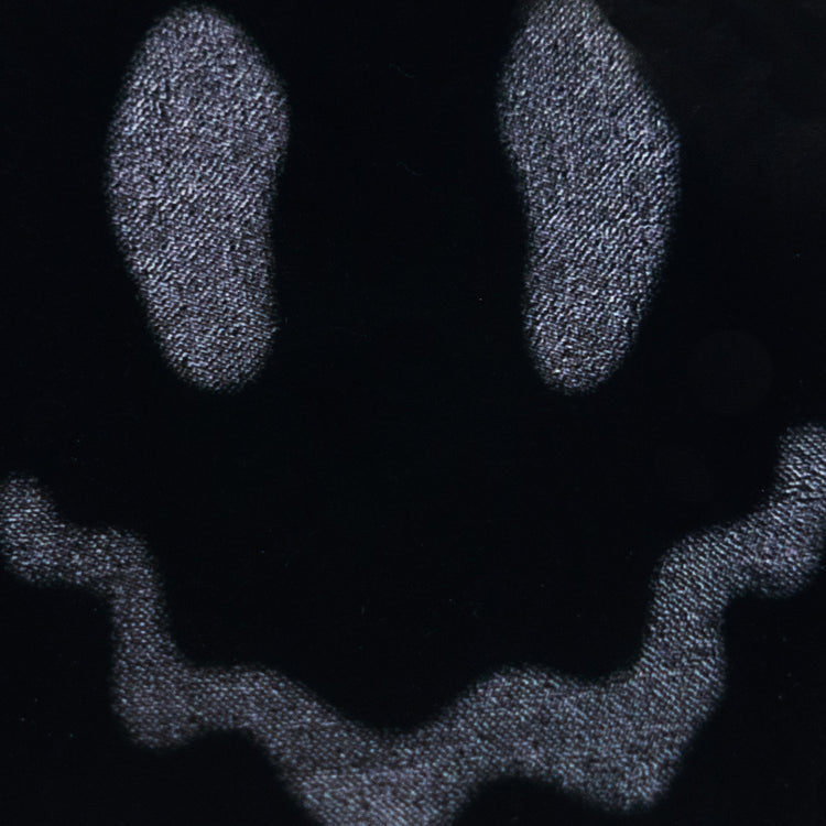 Smiley Sticker — close-up texture detail